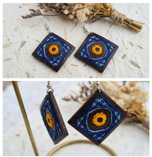 Örhängen av kokosnötsskal och bomullstråd