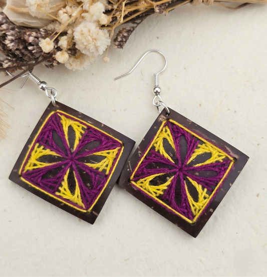 Örhängen i kokosnötskal och bomullstråd